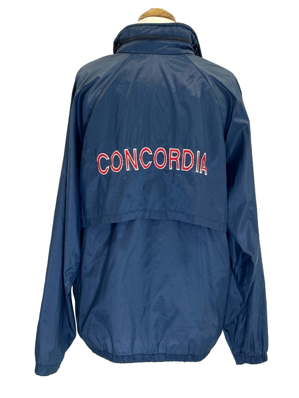 Concordia University navy windbreaker